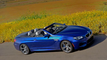 2012 BMW M6 Convertible roof down side profile