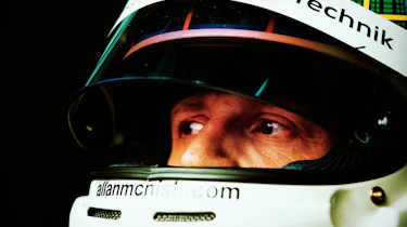 Allan McNish wearing helmet