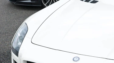 Mercedes SLS AMG Roadster vs Aston Martin DBS Volante evo track battle