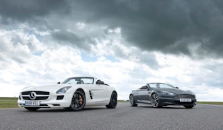 Mercedes SLS AMG Roadster vs Aston Martin DBS Volante evo track battle