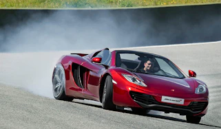 McLaren MP4-12C Spider volcano red drifting