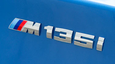 2012 BMW M135i badge
