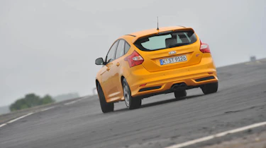 2012 Ford Focus ST orange on track
