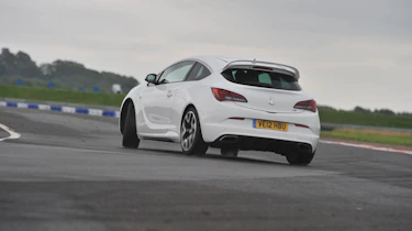 2012 Vauxhall Astra VXR white on track