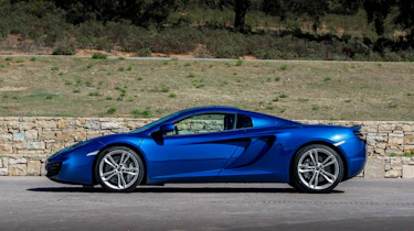 McLaren 12C Spider side profile roof up