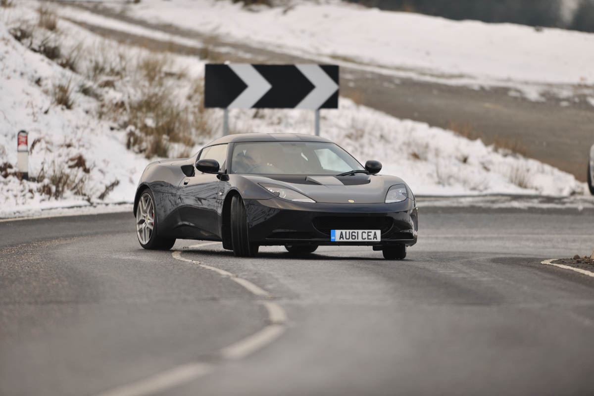 Porsche 911 Carrera group test Lotus Evora S drift