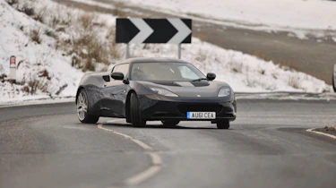 Porsche 911 Carrera group test Lotus Evora S drift