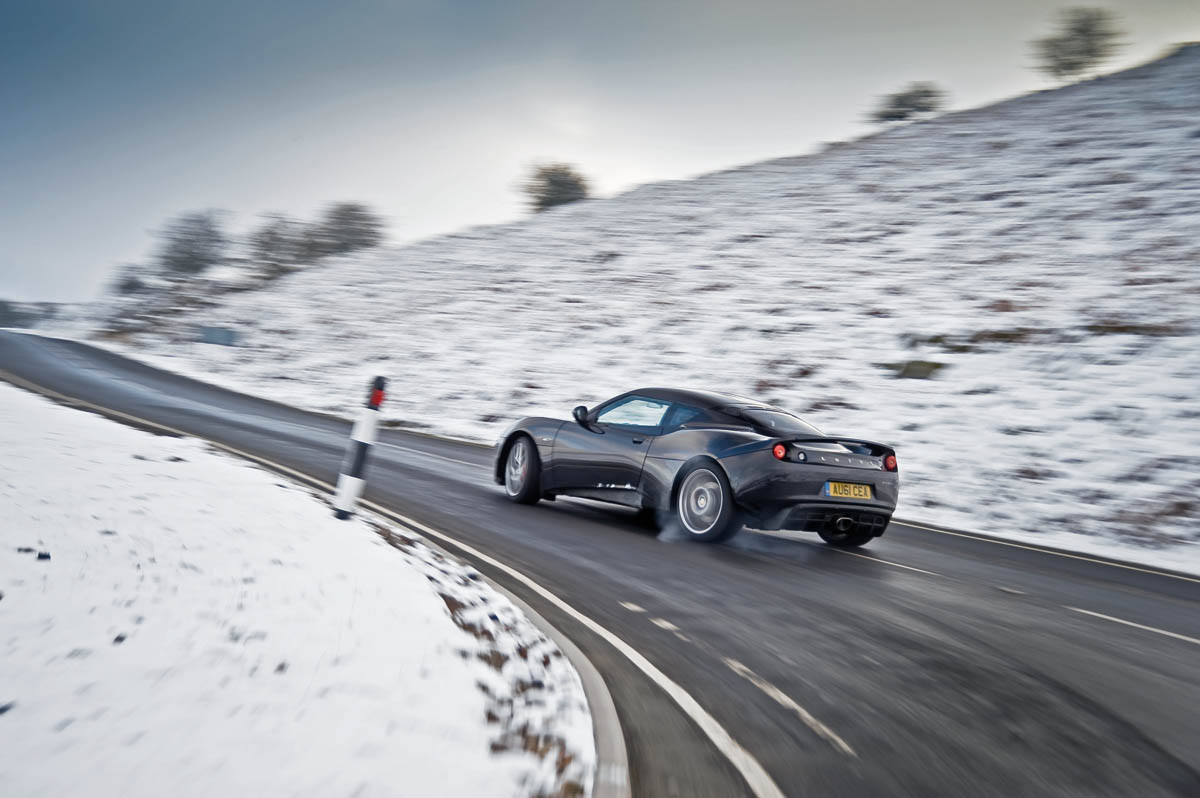 Porsche 911 Carrera group test Lotus Evora S drift