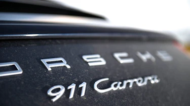 Porsche 911 Carrera group test badge