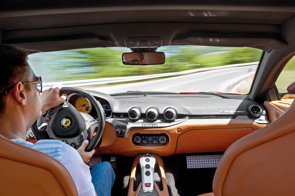 Ferrari F12 Berlinetta interior driving shot