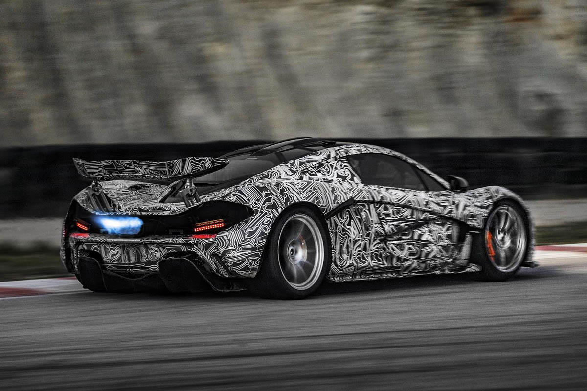 McLaren P1 supercar blue exhaust flame