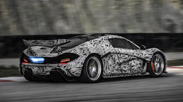 McLaren P1 supercar blue exhaust flame