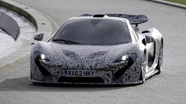 McLaren P1 supercar on track Jenson Button