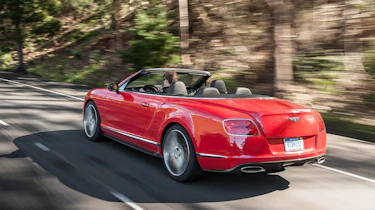 2013 Bentley Continental GT Speed Convertible red rear view roof down