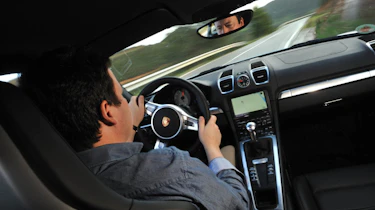 2013 Porsche Cayman S interior driving