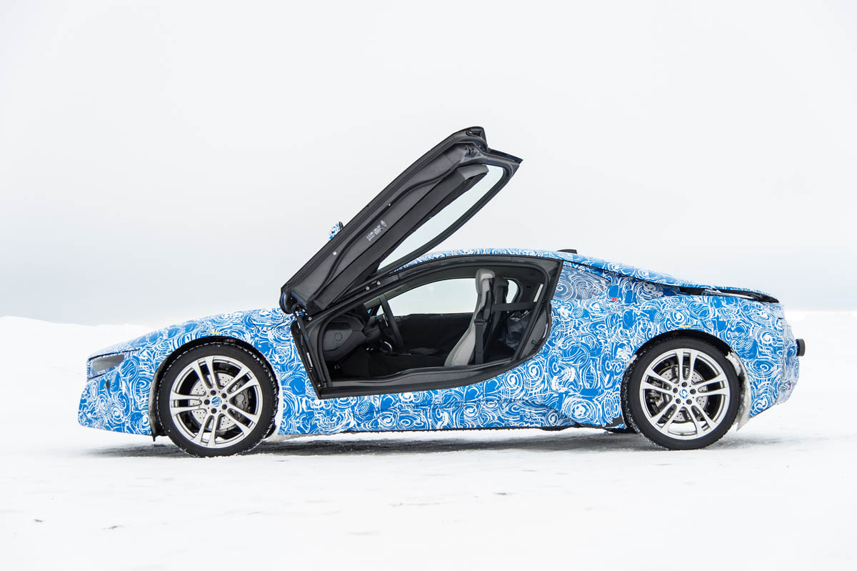 BMW i8 hybrid sports car side profile doors up