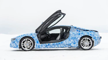 BMW i8 hybrid sports car side profile doors up