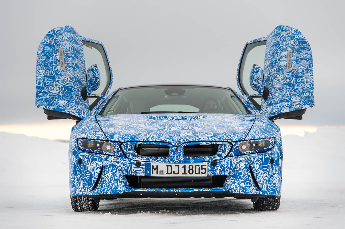 BMW i8 hybrid sports car doors up front view