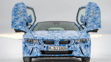 BMW i8 hybrid sports car doors up front view