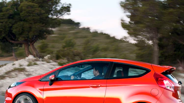 2013 Ford Fiesta ST red side profile