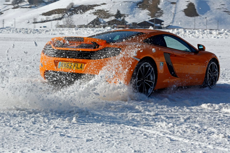 McLaren MP4-12C orange on snow