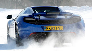 McLaren MP4-12C blue on snow