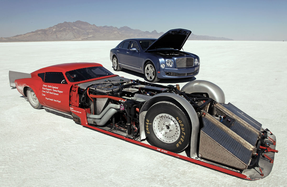 Mad Triumph GT6 meets Bentley Mulsanne