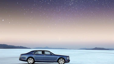 Bonneville salt flats at night with Bentley Mulsanne