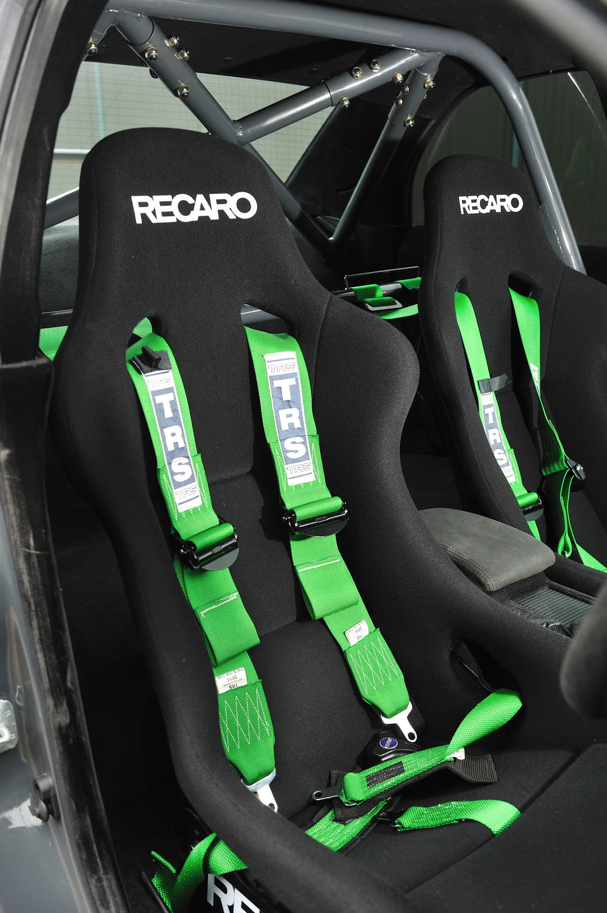 Revolution Project STI Nurburgring Subaru Impreza front seat green harnesses