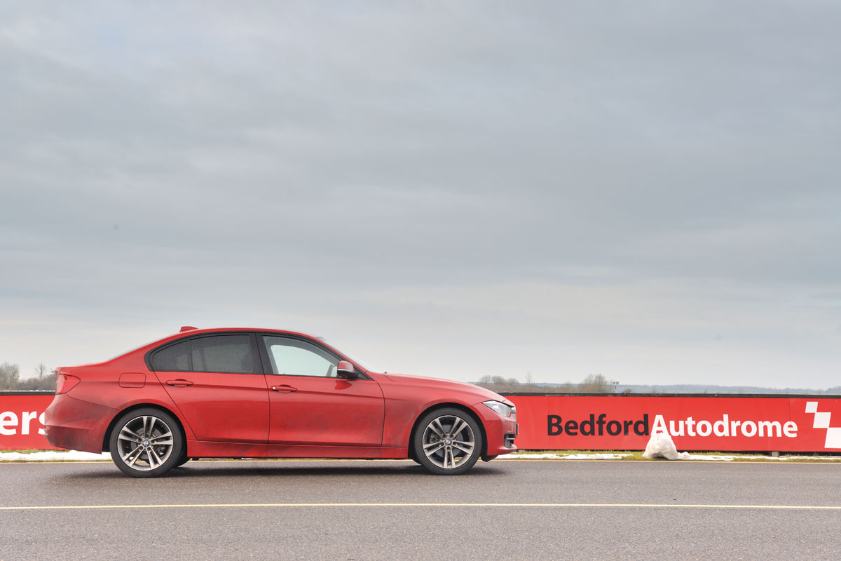 BMW 320d m sport side profile red