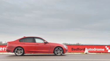 BMW 320d m sport side profile red