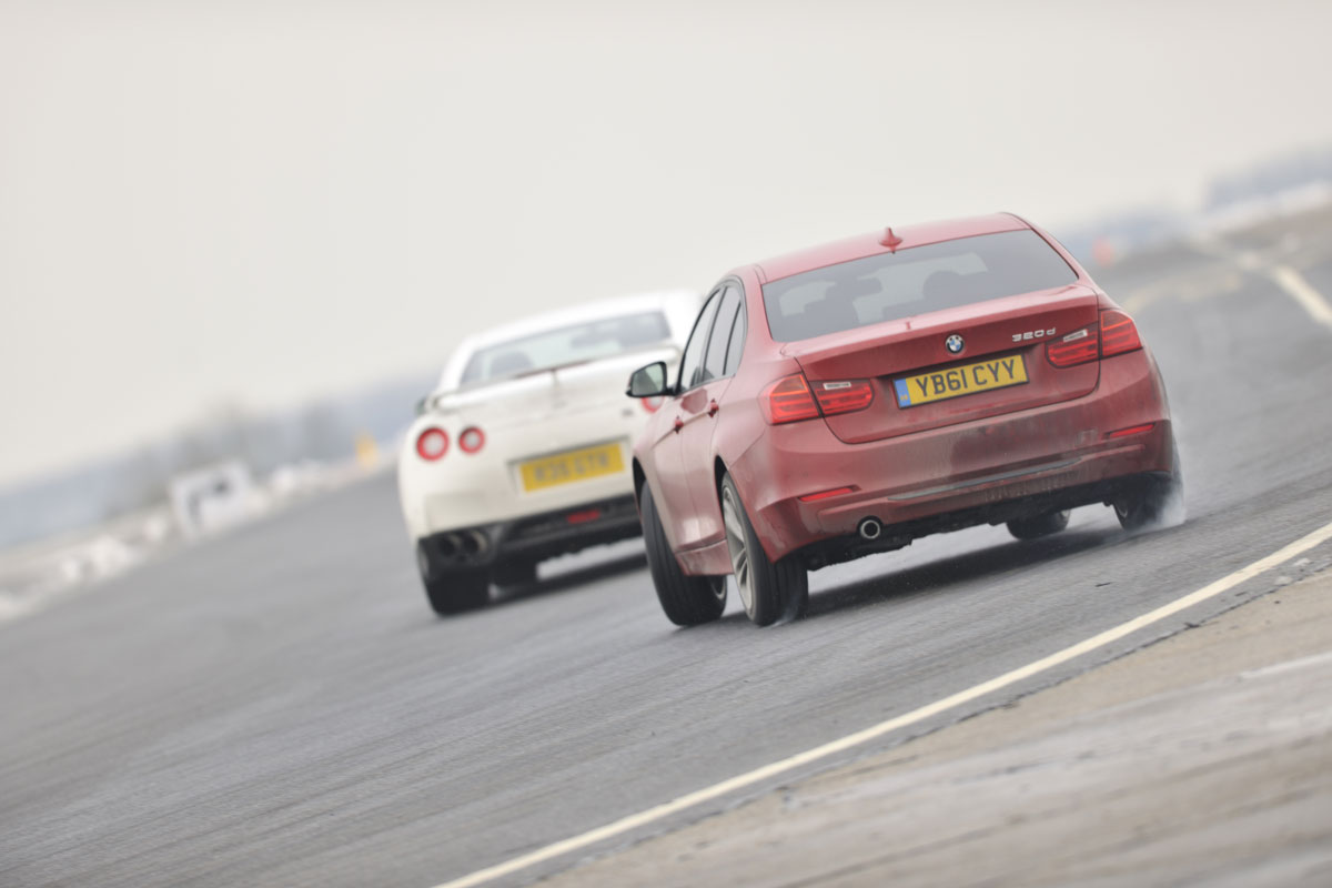 BMW 320d sideways drift on track red f30