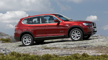 2013 BMW X3 sDrive 18d side profile