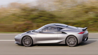 Infiniti Emerg-e side profile tracking shot