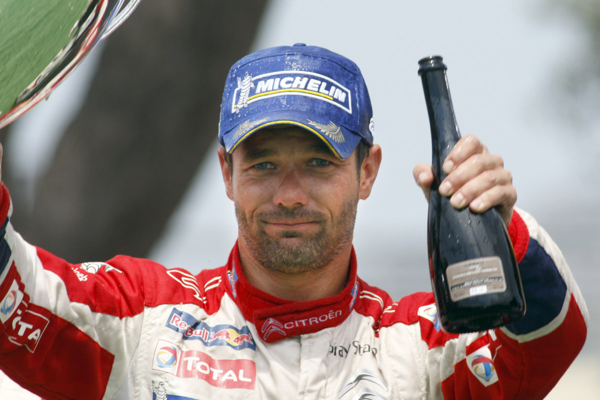 Sebastien Loeb win victory champagne