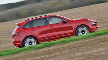 2013 Porsche Cayenne Turbo S red side profile