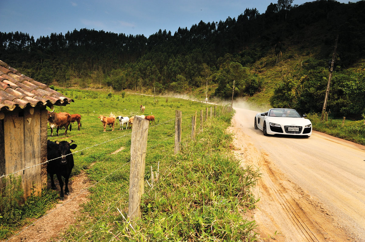 Audi R8 V10 Spider driving on dirt road