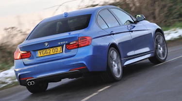 2013 BMW 330d M Sport blue rear