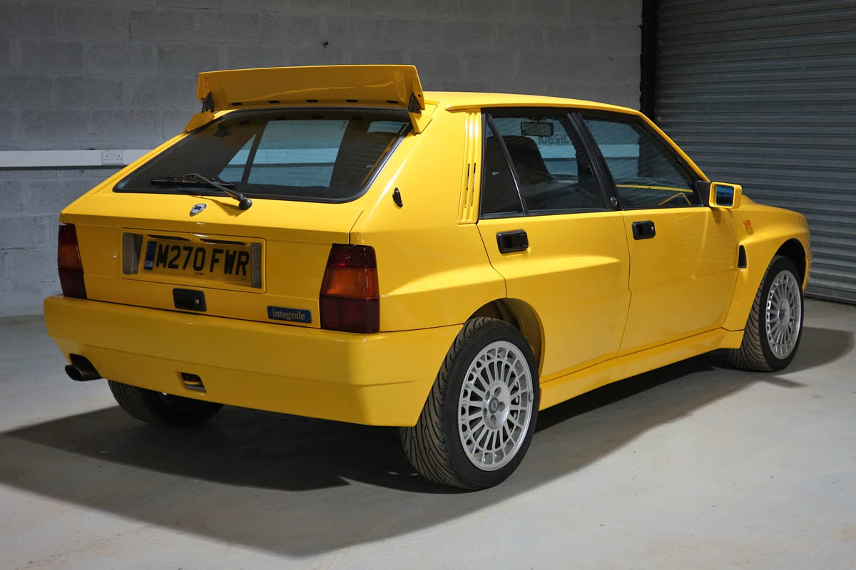 Lancia Delta Integrale Evo yellow rear spoiler up
