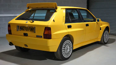 Lancia Delta Integrale Evo yellow rear spoiler up