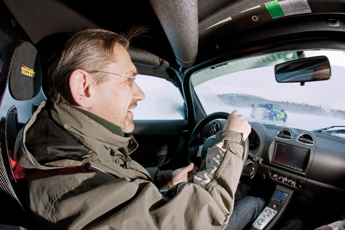 John Barker at the wheel