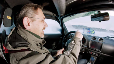 John Barker at the wheel