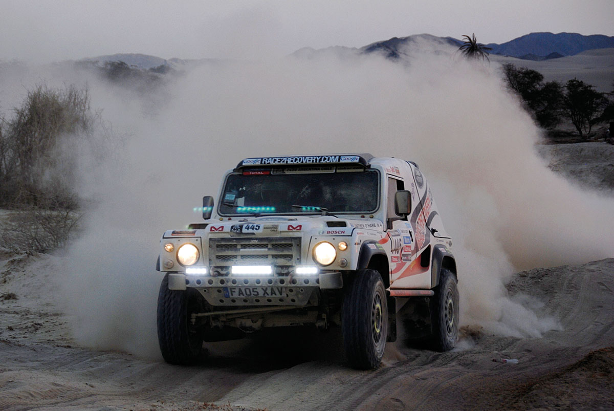 Race2Recovery Land Rover yumping on the Dakar Rally