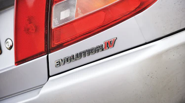 Mitsubishi Evo IV badge