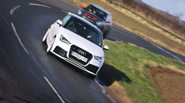 Audi A1 Quattro and Mini GP cornering