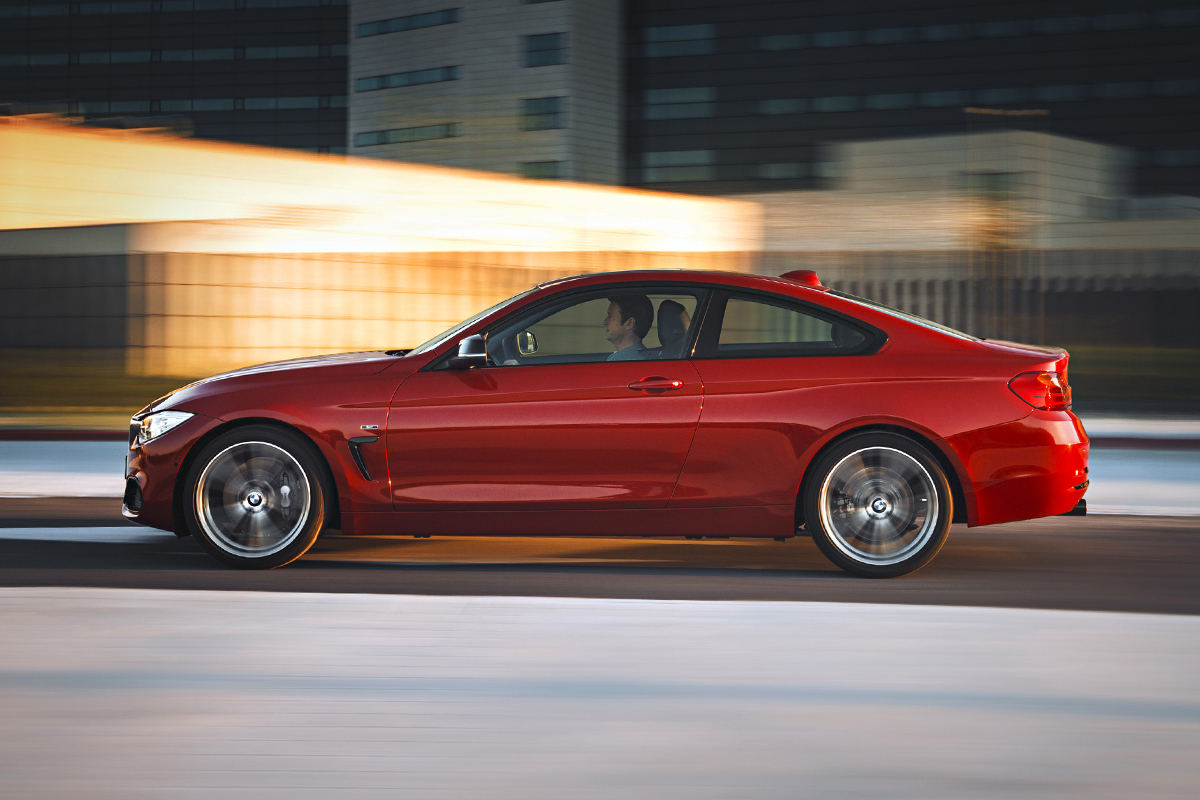 New BMW 4-series coupe red side profile