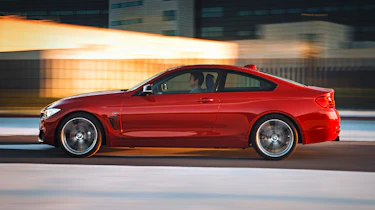New BMW 4-series coupe red side profile