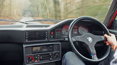 BMW M5 E28 interior driving