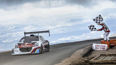 Red Bull Peugeot 208 T16 Pikes Peak record time finish line