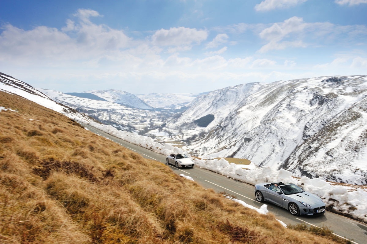 Porsche 911 Cabriolet v Jaguar F-type V6S  in the hills
